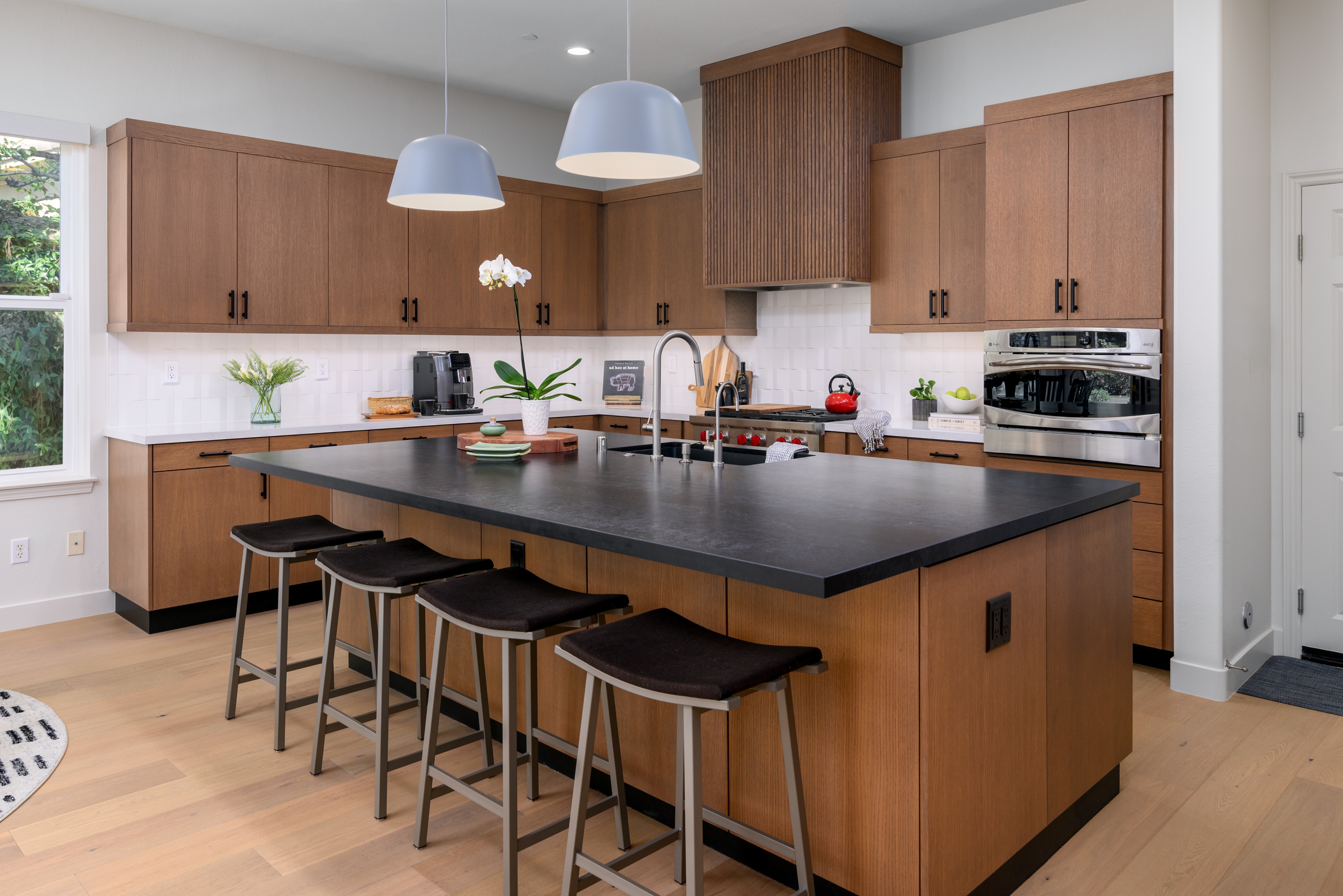 Modern kitchen with rift oak cabinetry and large island